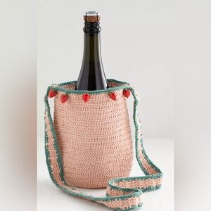 Urban Outfitters Strawberry Woven
Bottle Sling Bag